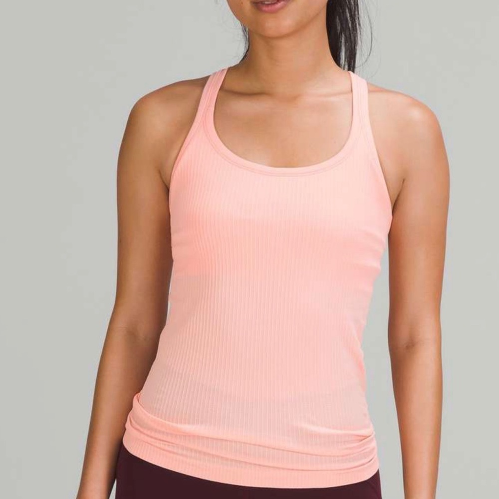 Lululemon Ebb to Street Tank in color dew pink.